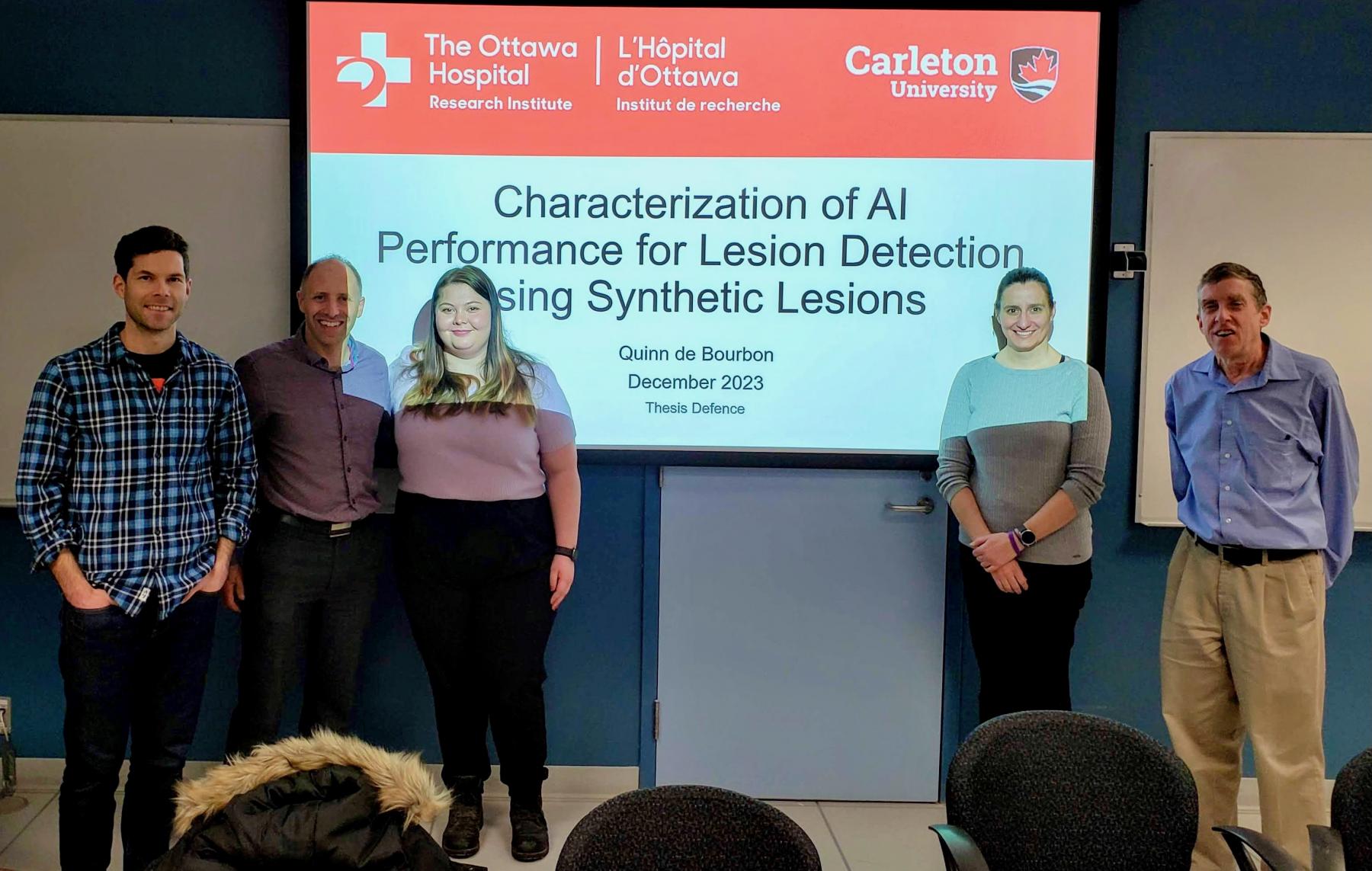 In the picture from left to right: Dr. Avery Berman (Carleton, Physics), Dr. Klein, Quinn, Dr. Leila Mostaço-Guidolin (Carleton, Systems & Computer Engineering), and Dr. Paul Johns (Carleton, Physics)