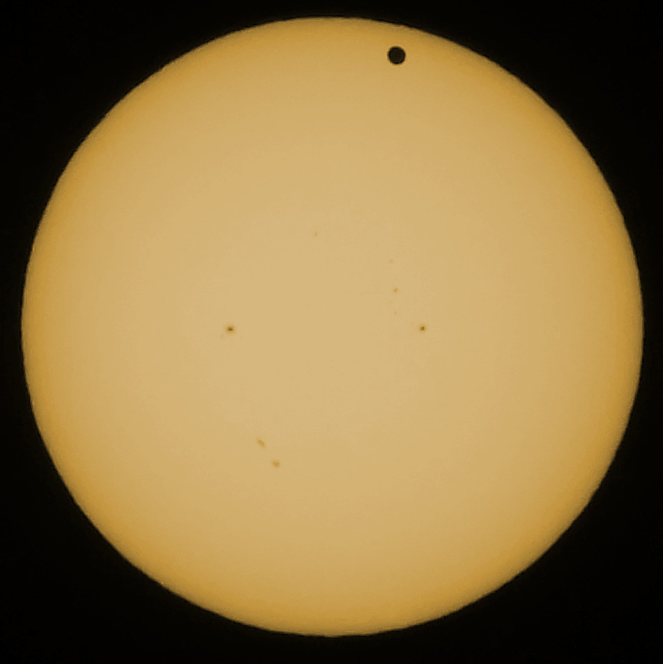 sunspots are clearly visible on the sun