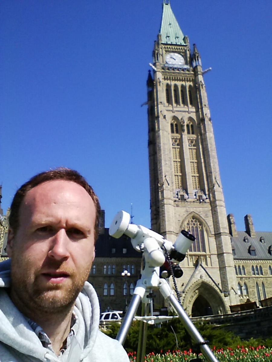 "The Science Odyssey organized a public observing event at the Canadian Parliament. Roughly 20 telescopes were installed in the front lawn"